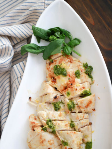 Lemon broiled chicken with basil sauce, gluten free and dairy free.