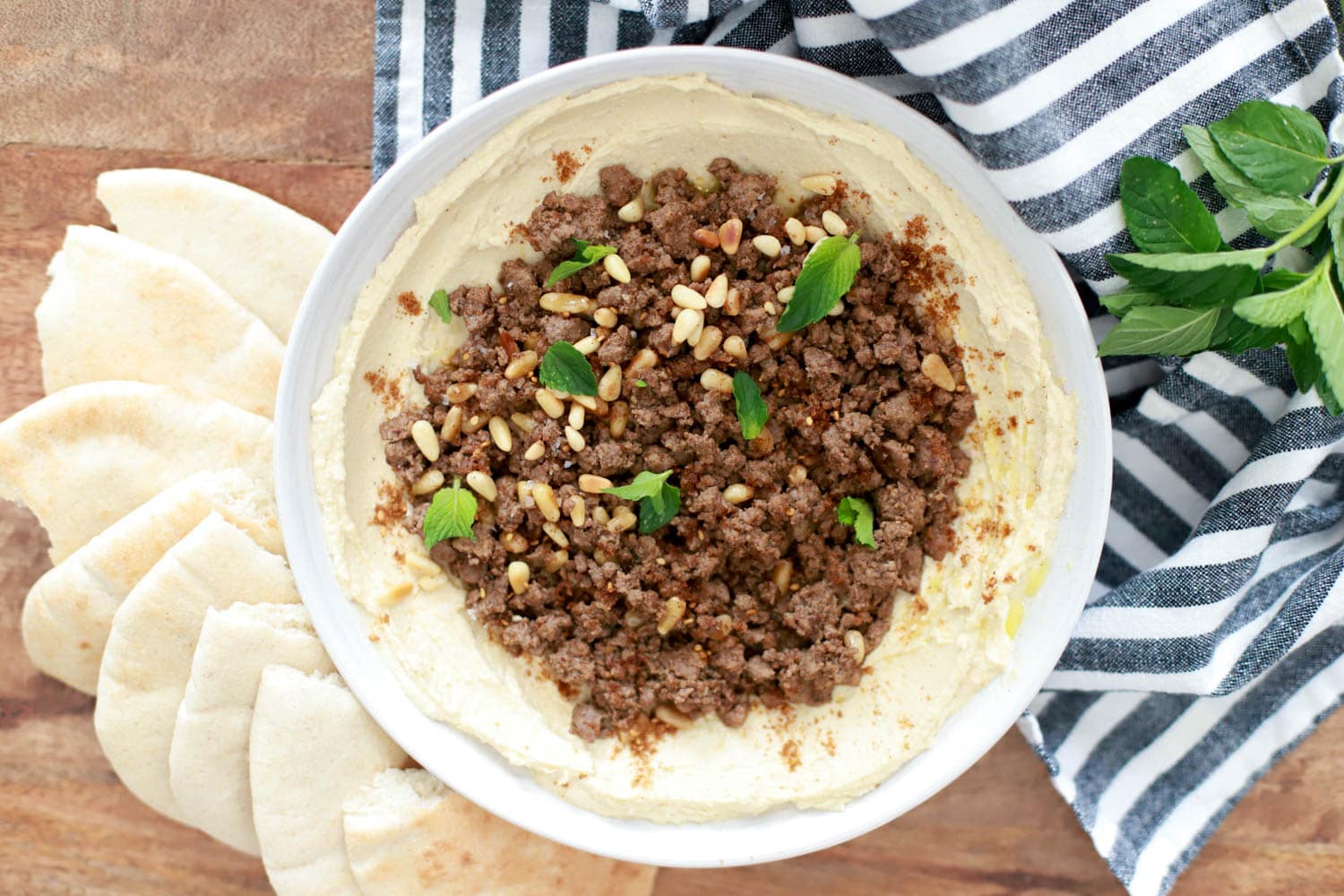 Spiced Ground Meat with Pine Nuts over Hummus Recipe