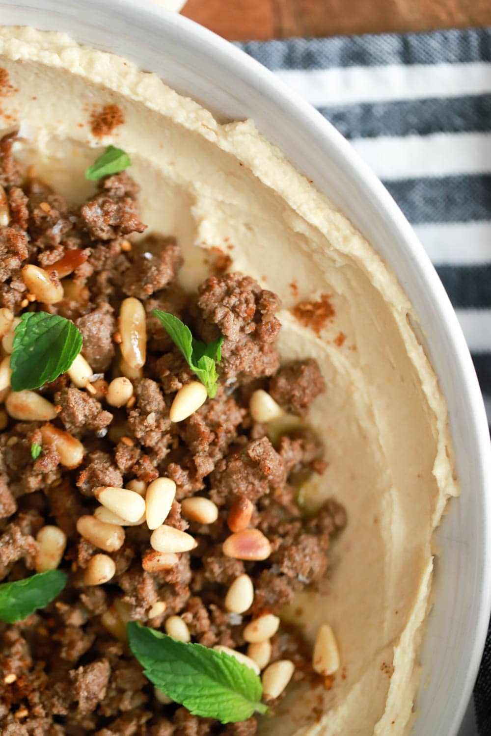 Spiced Ground Meat with Pine Nuts over Hummus Recipe