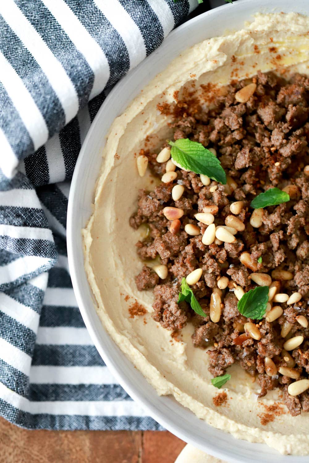 Spiced Ground Meat with Pine Nuts over Hummus Recipe