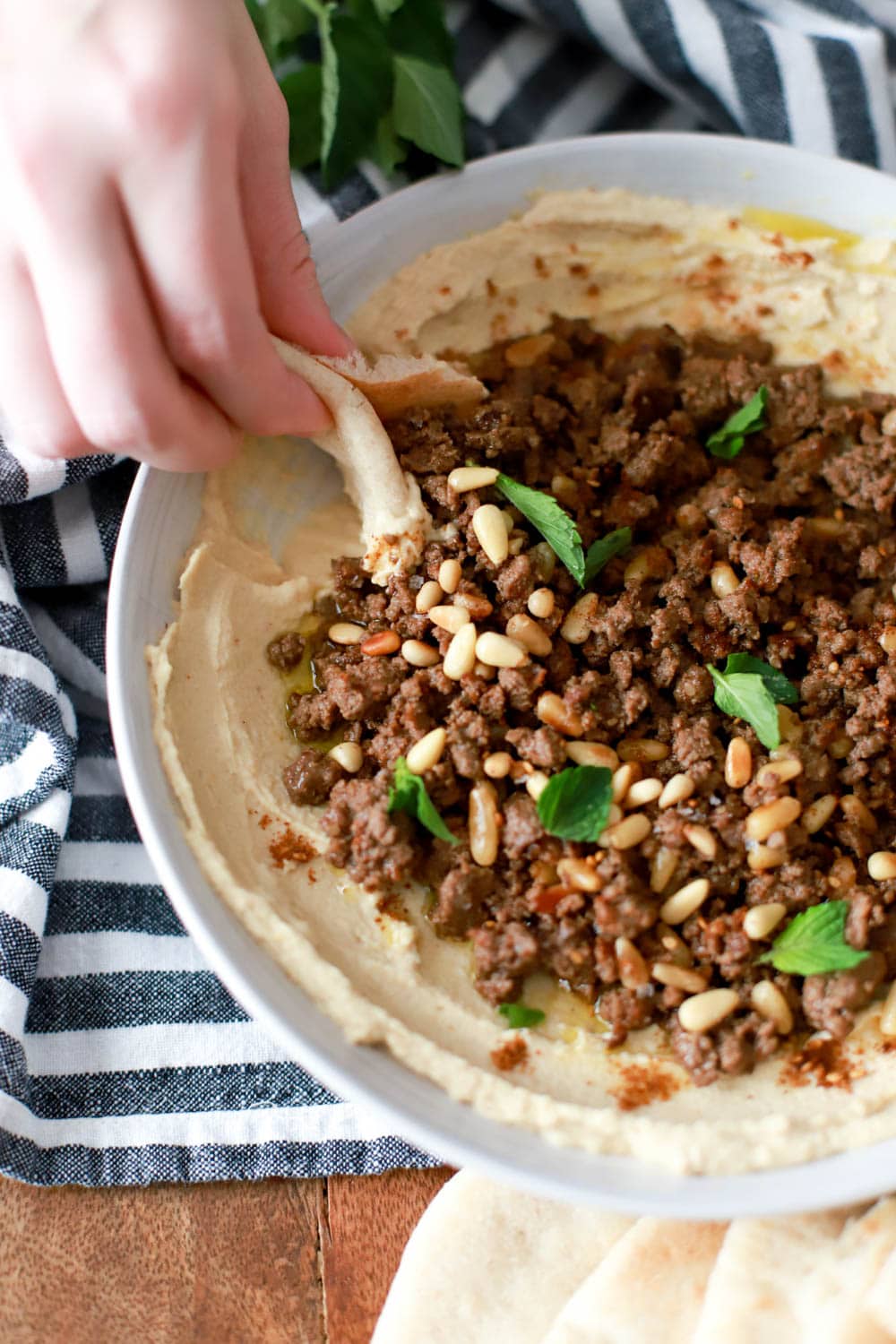 Spiced Ground Meat with Pine Nuts over Hummus Recipe