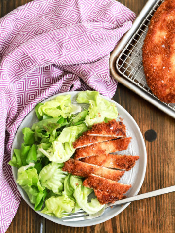 chicken cutlets served with salad
