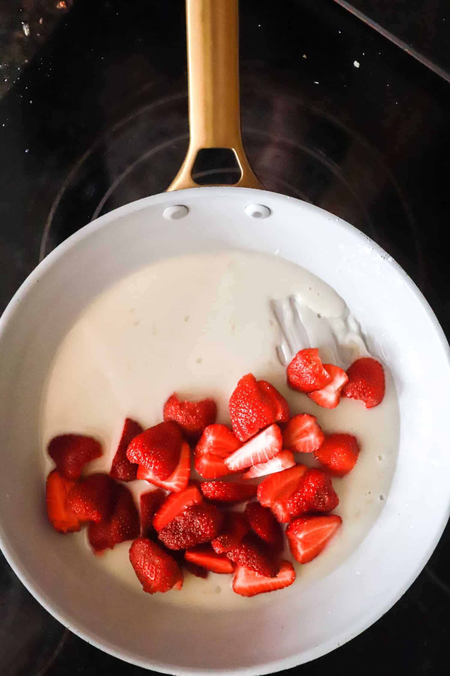 fresh strawberries in skillet with cornstarch