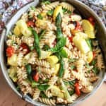 round bowl full of pasta salad with veggies
