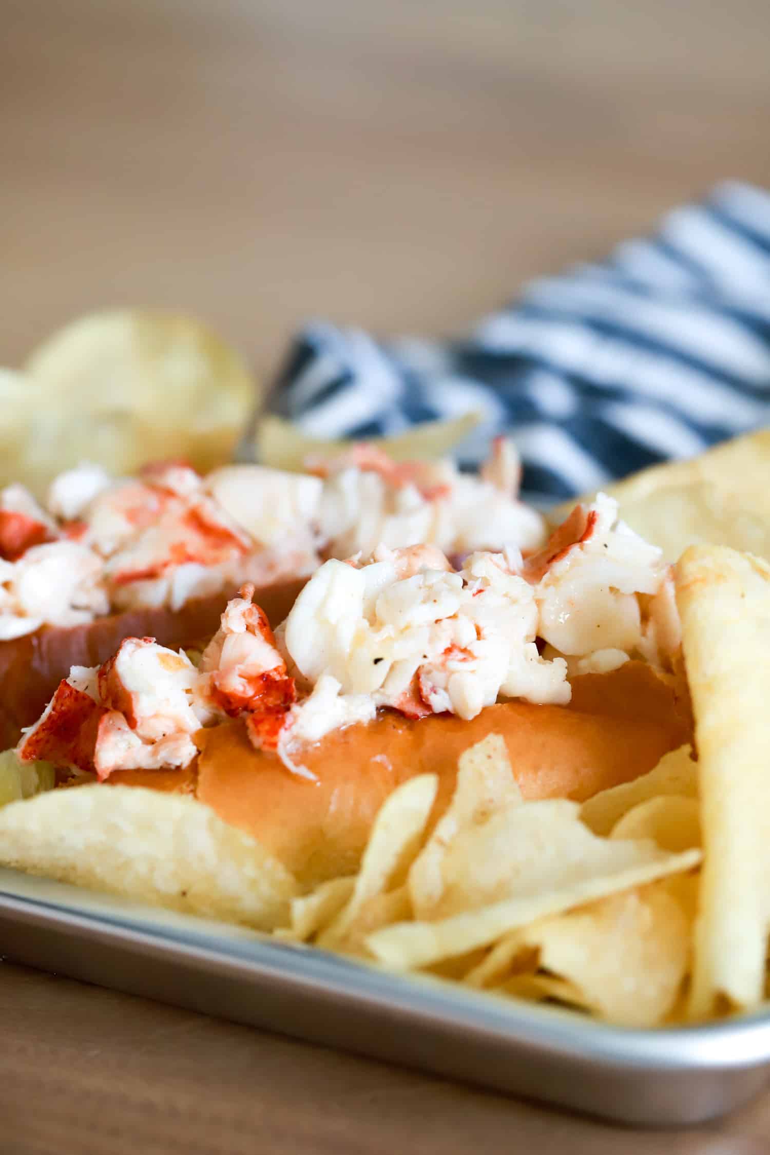 warm lobster rolls with potato chips