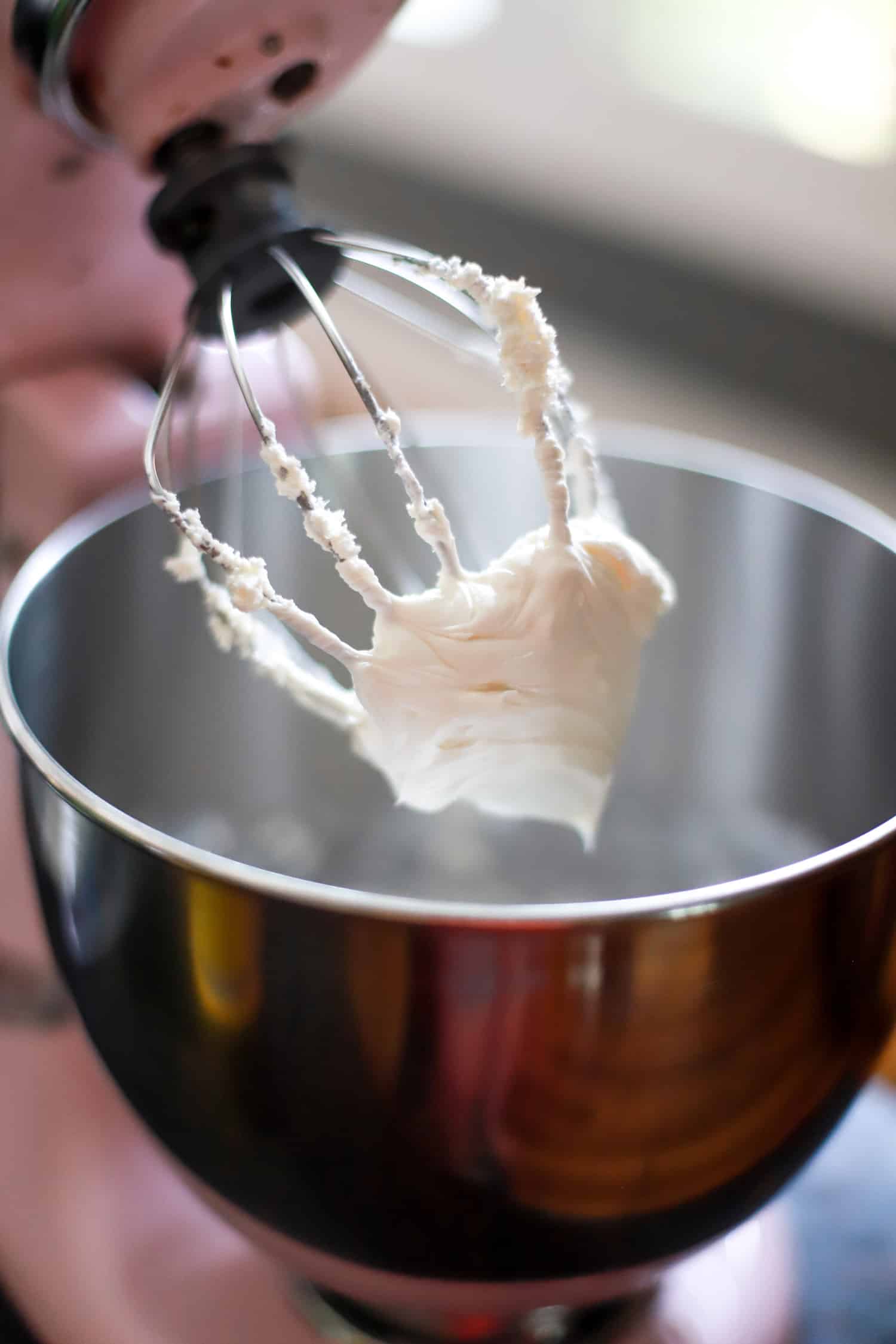 whipped cream chese on beater in stand mixer