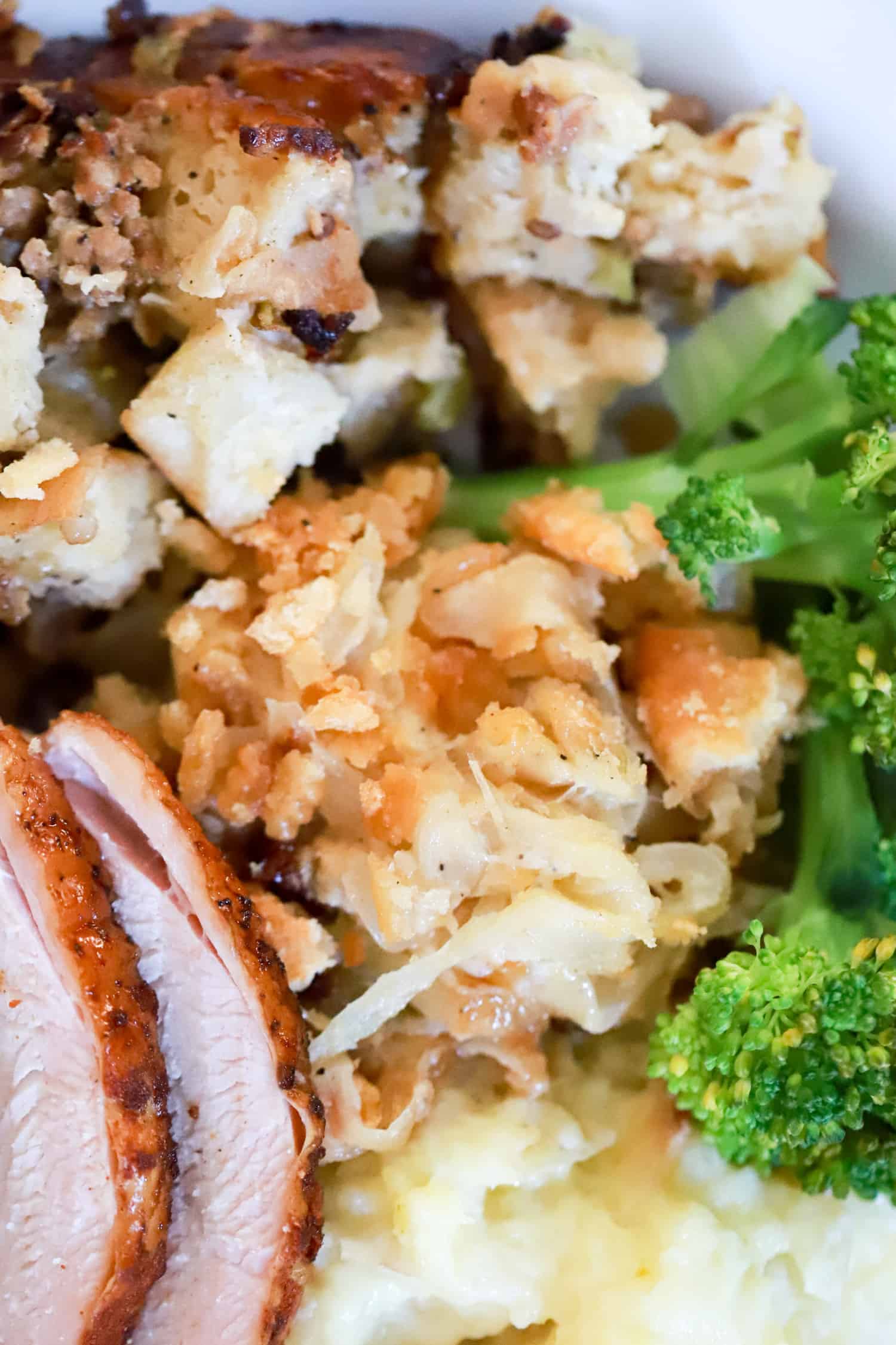 thanksgiving plate with turkey and sides close up.