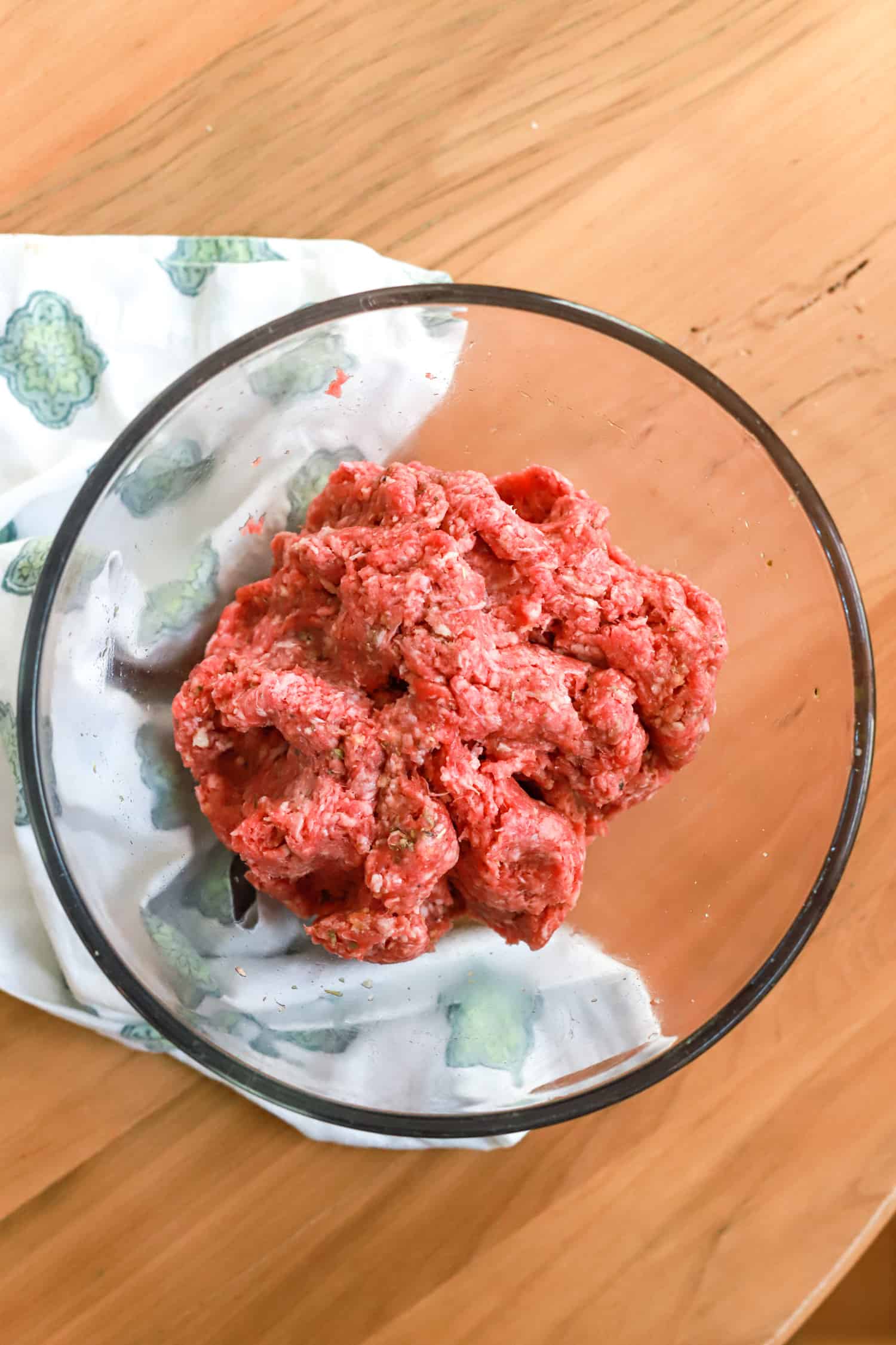 ground meat mixture in glass bowl.