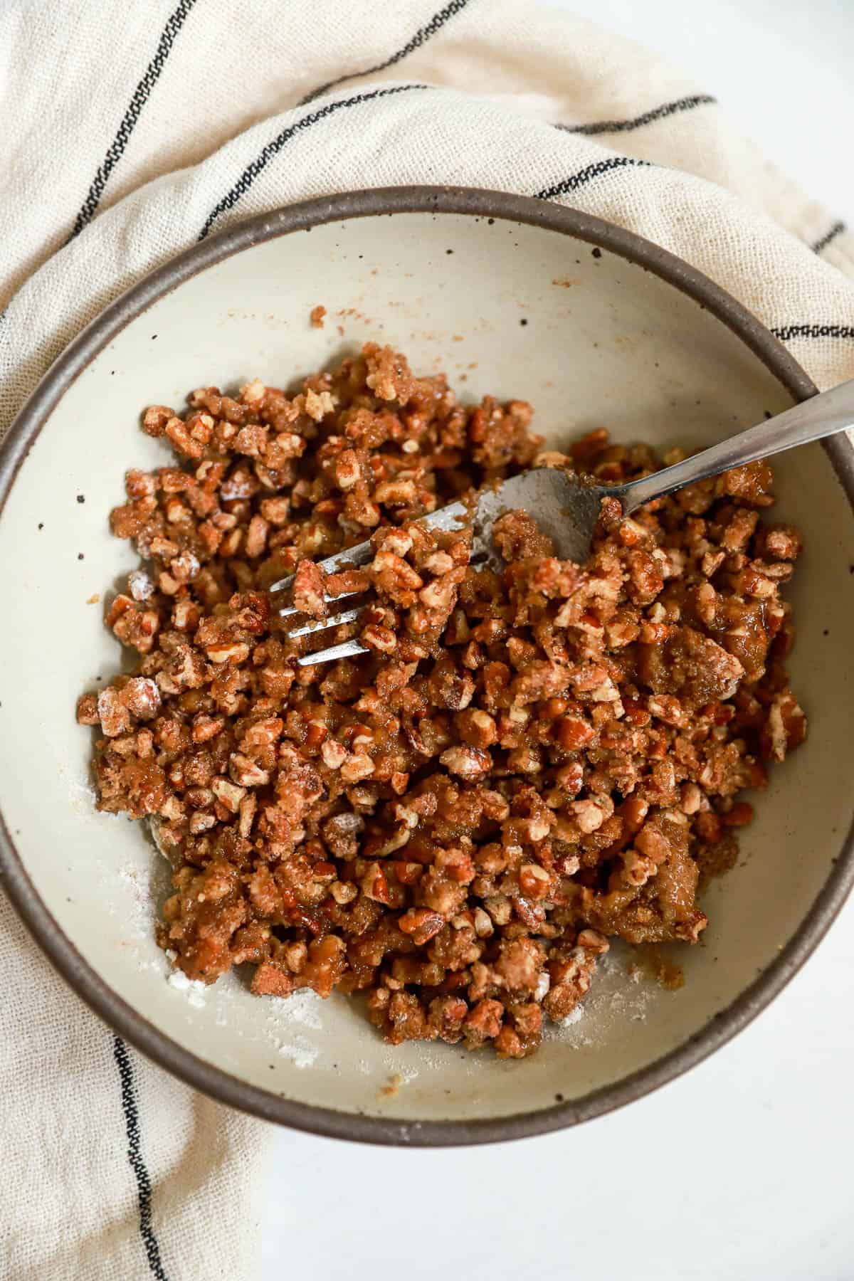 Pecan crumble topping for carrot souffle.